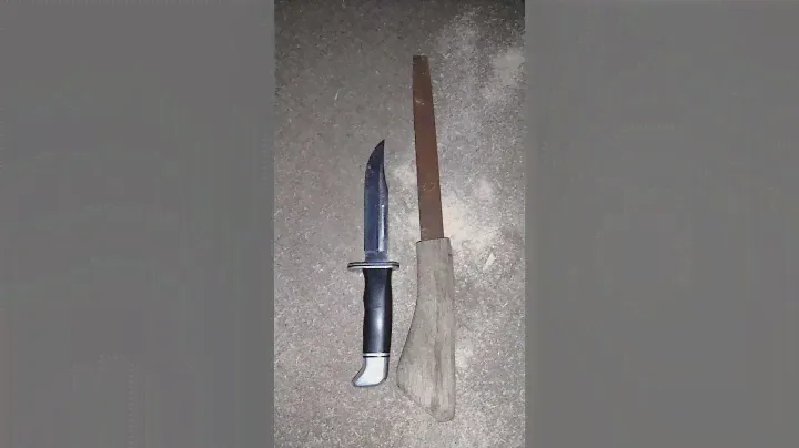 making a custom knife from a old axe handle and a old bastard file pt 1